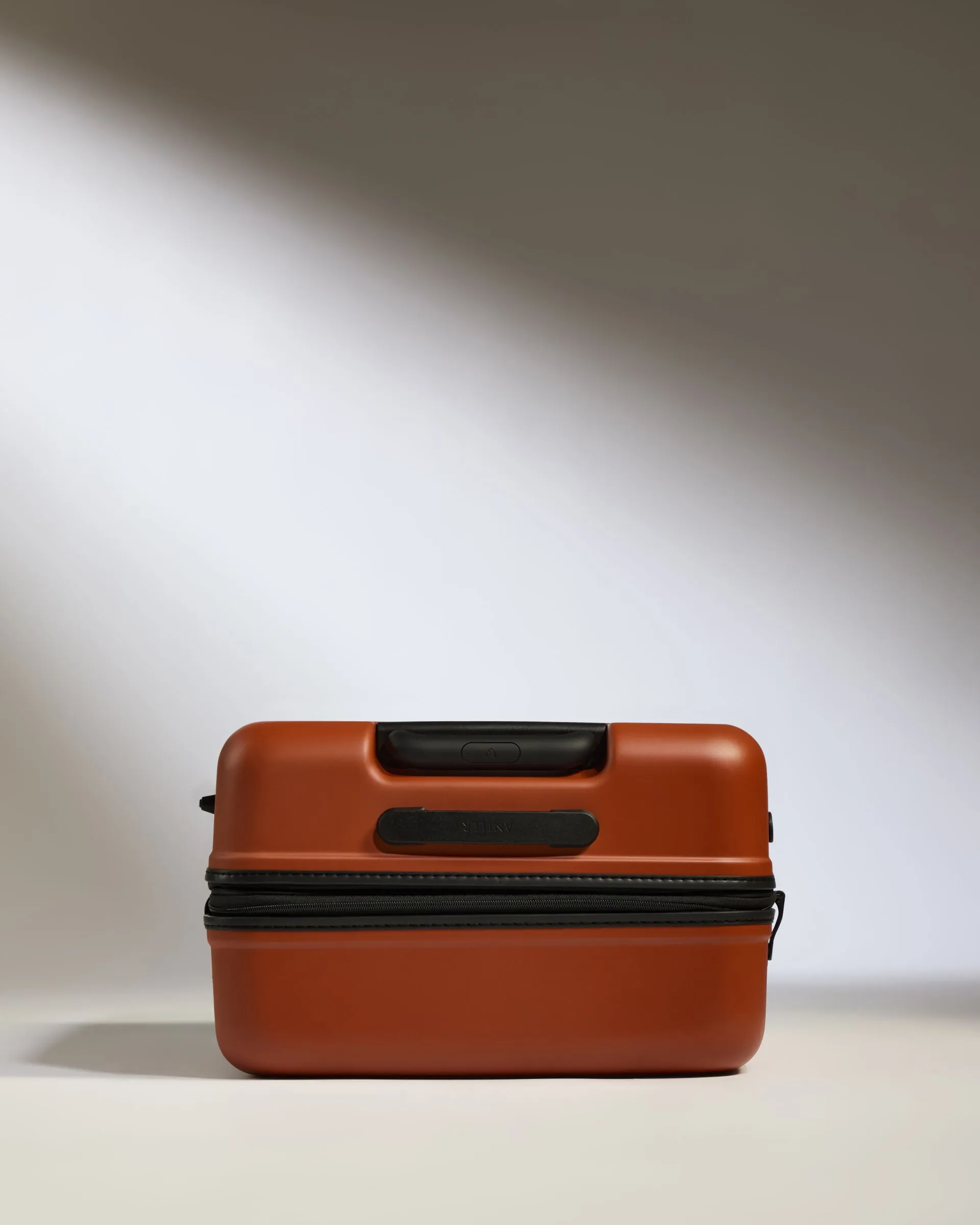 Medium Suitcase in Maple Red - Icon Stripe